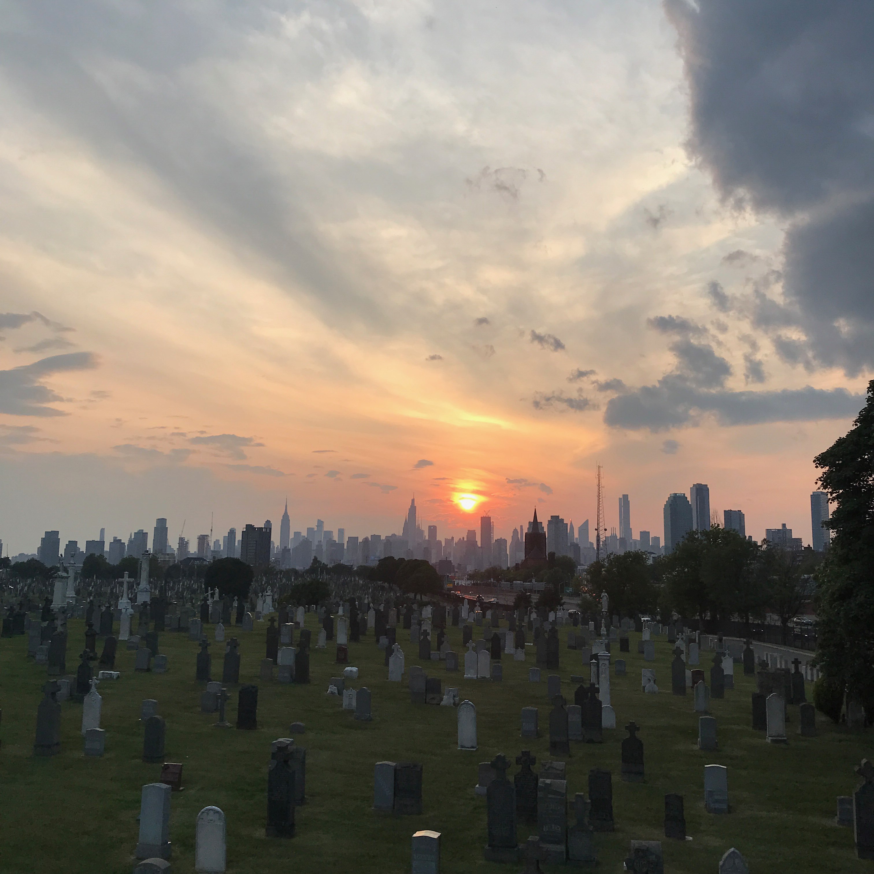 Sunset view of Manhattan from behind the Calvary Cemetery
